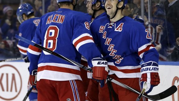 Rangers Derek Stepan celebratesafter scoring from center ice 