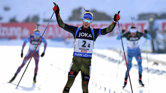 Germany Simon Schempp celebrates finishMixed relay 