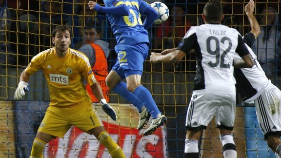 BATEs Mikhail Gordeichuk, center, scores against Partizan Belgrade 