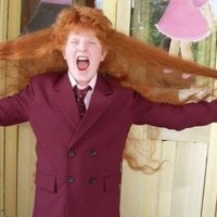 ФОТО: Украинский подросток отрастил волосы длиной больше метра