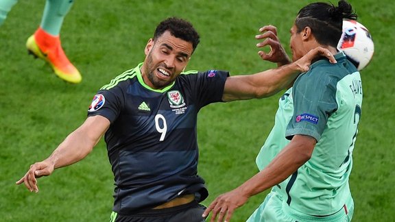 Wales forward Hal Robson-Kanu and Portugal s defender Bruno Alves 