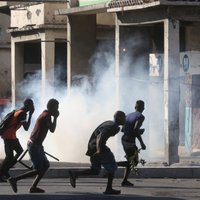 Foto: Demonstranti Haiti pieprasa prezidenta atkāpšanos