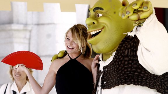 Actors Diaz poses with character Shrek during a photocall in Madrid