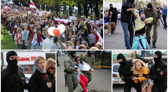 Foto: Minskā gājienā godina nacionālā karoga dienu; OMON aiztur dalībnieces