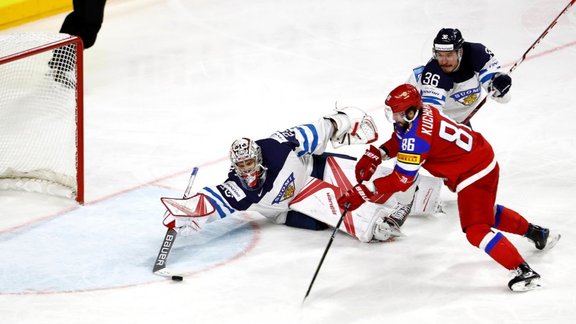 Russia forward Nikita Kucherov, Finland goalkeeper Harri Sateri