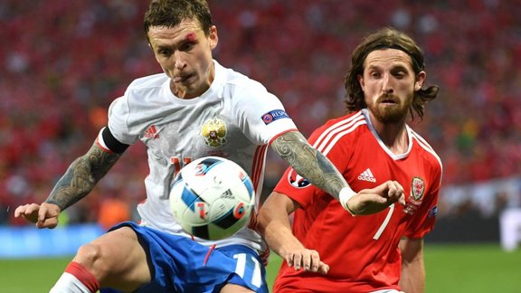 Russia Pavel Mamaev against Wales Joe Allen