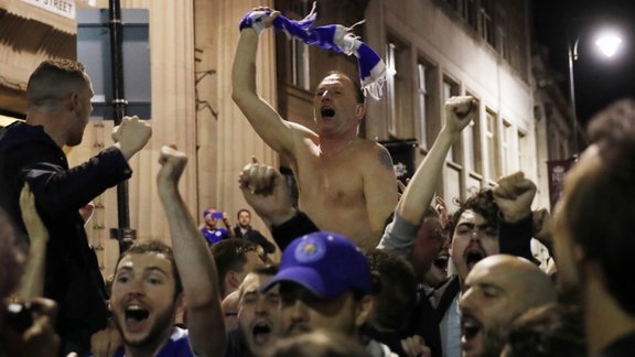  Leicester City fans watch the Chelsea v Tottenham Hotspur game in pub in Leicester 