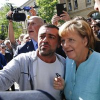 Reportāža: Kā 'Mamma Merkele' un Vācija tiek galā ar bēgļiem