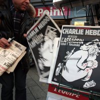 Ватикан обиделся на Charlie Hebdo за карикатуру "Бог-убийца"