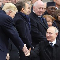 Путин и Трамп почти не поговорили в Париже. Почему так вышло?