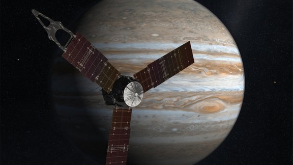 Juno spacecraft circling Jupiter