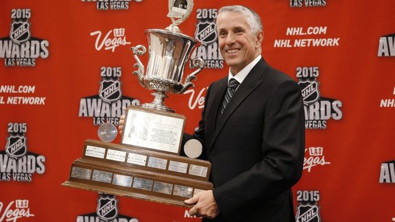 Calgary Flames coach Bob Hartley with the Jack Adams Award 