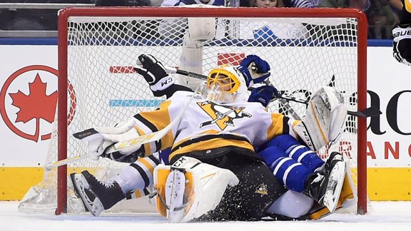 Marc-Andre Fleury and Toronto Maple Leafs forward James van Riemsdyk