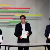 Vācijas SPD, zaļie un FDP paraksta koalīcijas līgumu