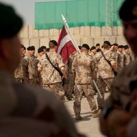Латвия думает увеличить число своих военных в операциях в Афганистане и Ираке